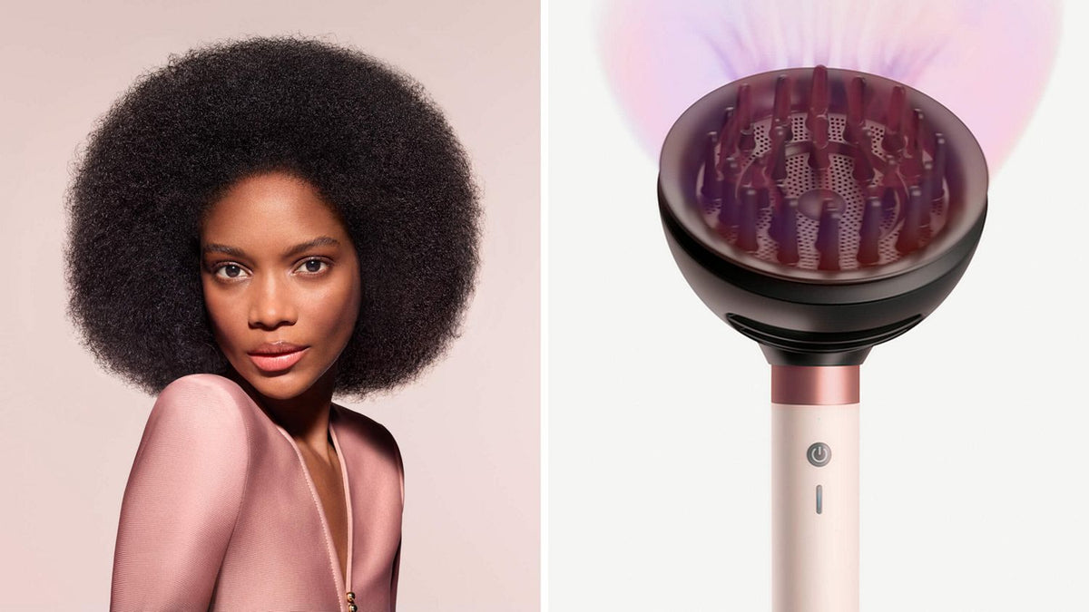 The Dyson Airwrap Co-anda2x multi-styler and dryer with the Wave+Curl diffuser 2x next to a model with dark coily hair.