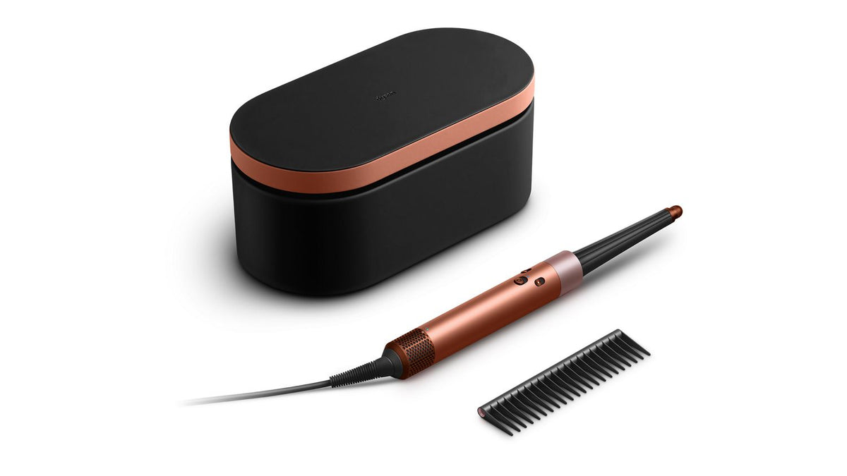 Dyson Airwrap ID displayed with Presentation case, Travel case and Detangling comb.