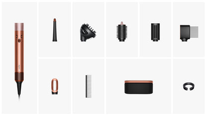Dyson Airwrap multi-styler with various black attachments including barrels, brushes & case.