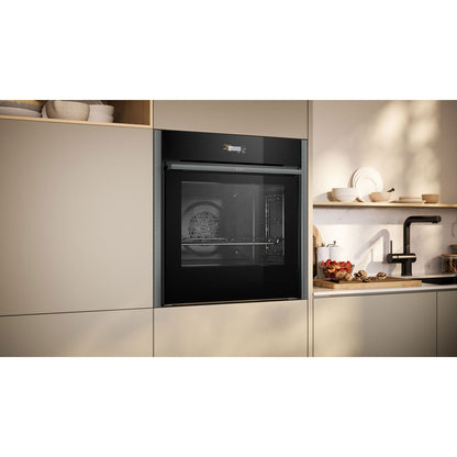 NEFF N70 Slide & Hide® Built In Electric Single Oven - Graphite - Oven in kitchen shot