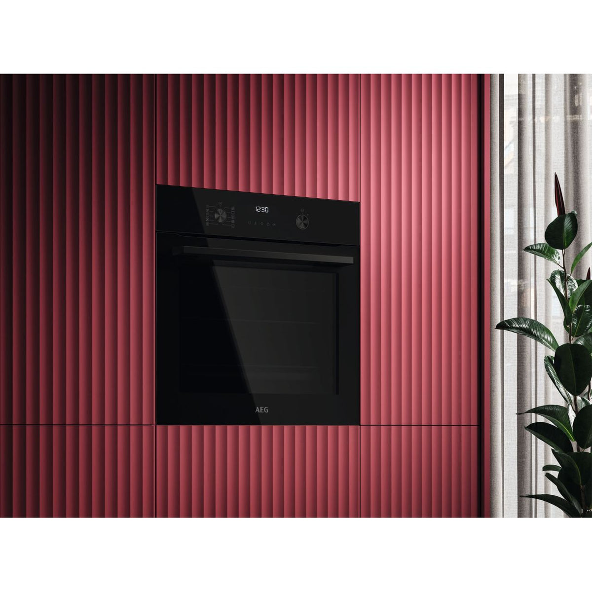 AEG SenseCook Aqua Built In Electric Single Oven - Black - Oven in kitchen shot