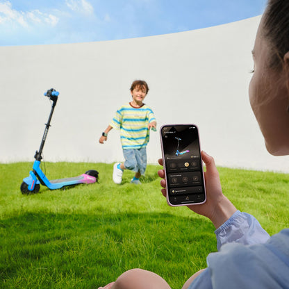 Navee Electric Scooter - family in garden shot 