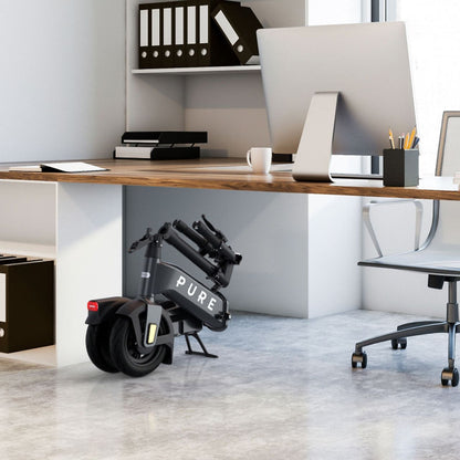 Pure Flex Electric Scooter - scooter collapsed under desk shot