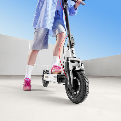 Navee Electric Scooter - Person riding scooter